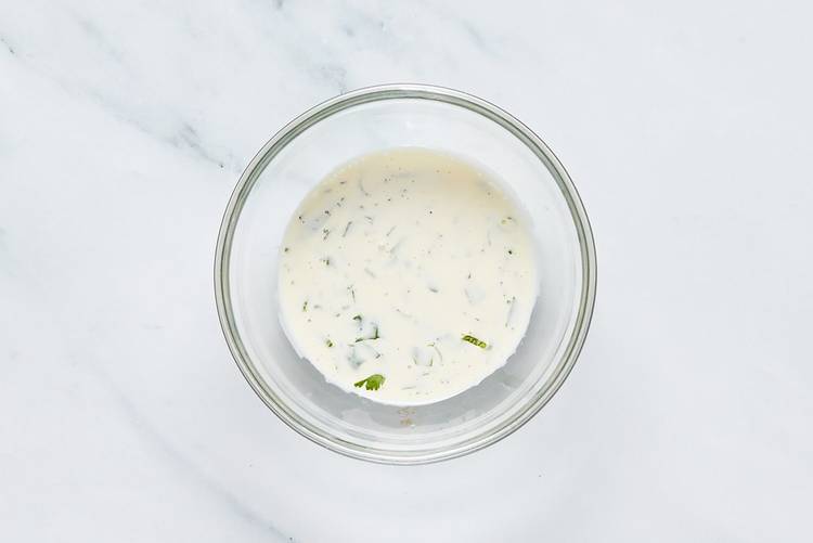Make garlic sauce and prep Impossible® patties