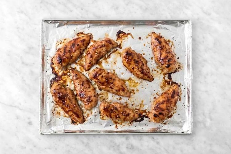 Cook chicken and prep veggies