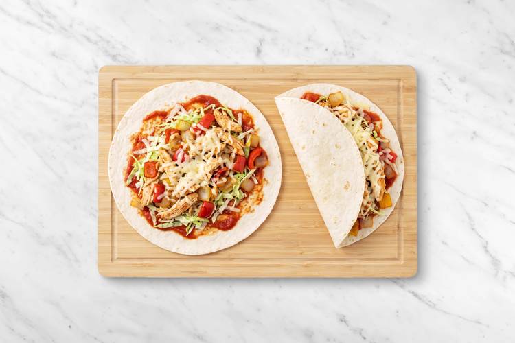 Effilocher le poulet et farcir les quesadillas