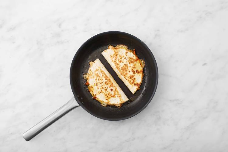 Cook quesadillas
