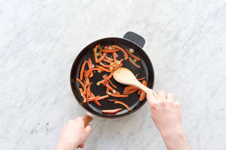 Cook the peppers and green onions