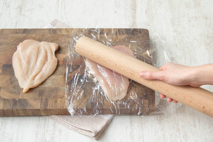 Flatten the chicken breasts