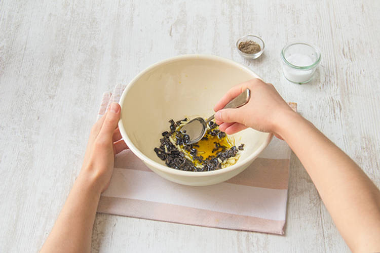 Make the black olive-sherry vinaigrette