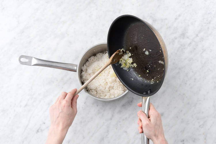 Transfer to the pot with the rice