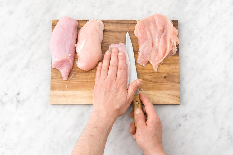 Slice the chicken in half