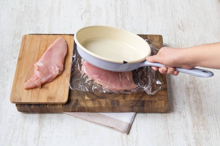 Pound the chicken breasts