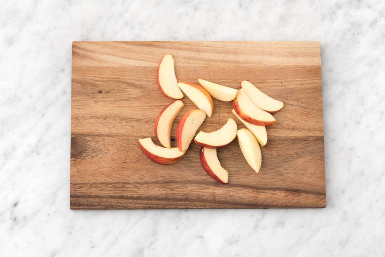 Cut the apple into wedges