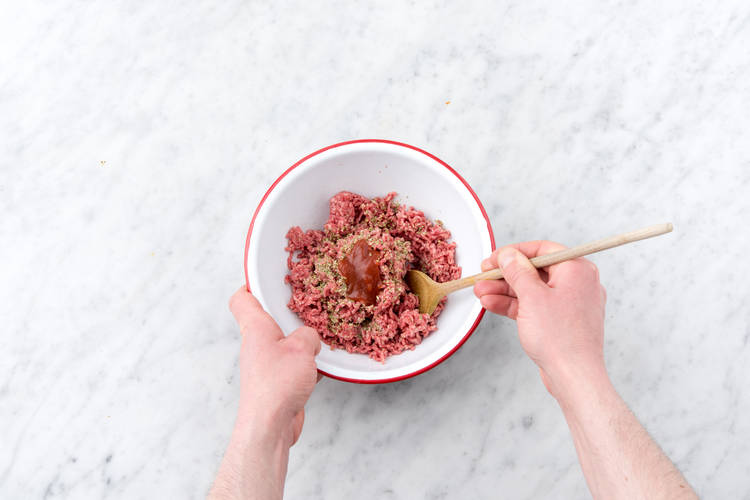 Mix mince with oregano & ketchup.