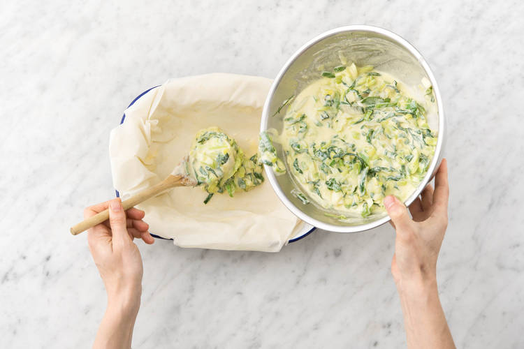 Spoon the silverbeet and ricotta mixture into the centre of the baking dish