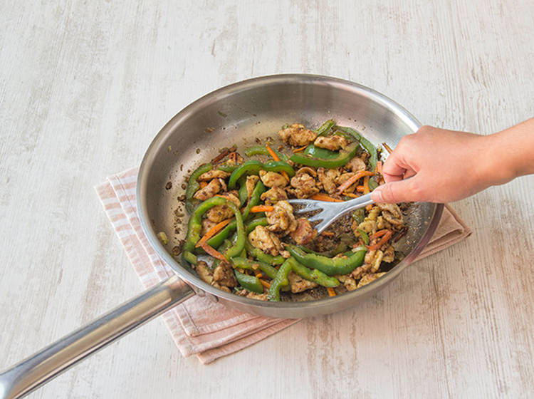 Cook pork and veggies.