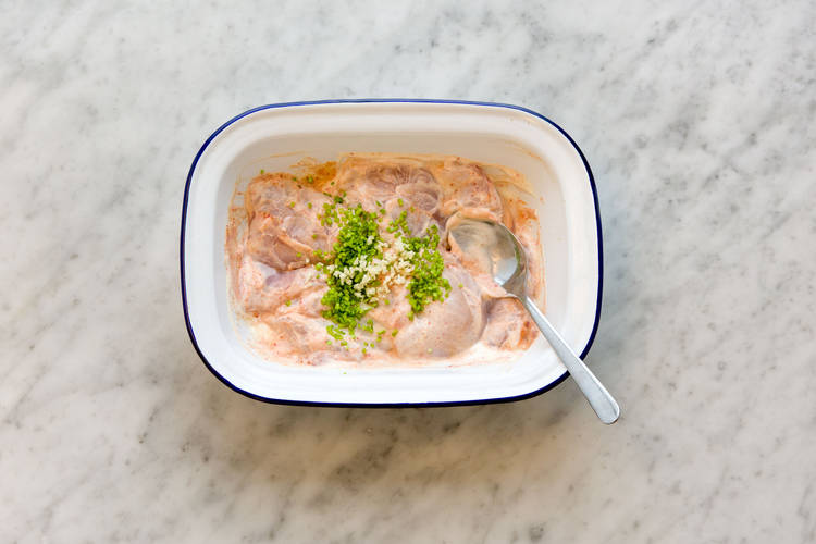 Marinate chicken.