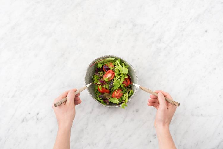 Toss the salad and serve