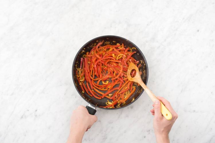 Cook the onions and peppers