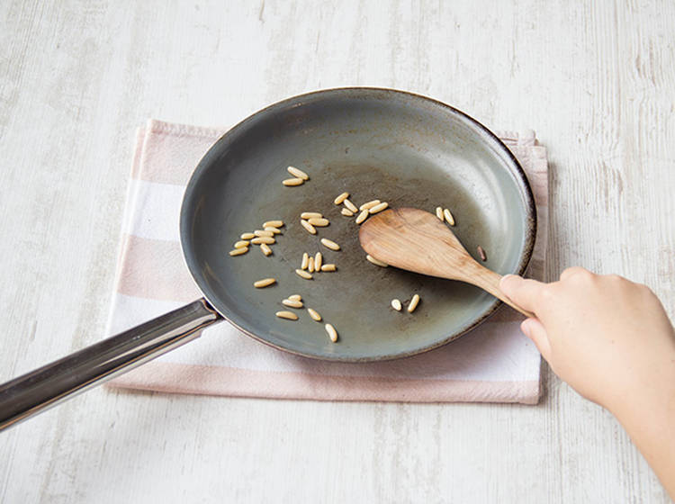 Toast the pine nuts
