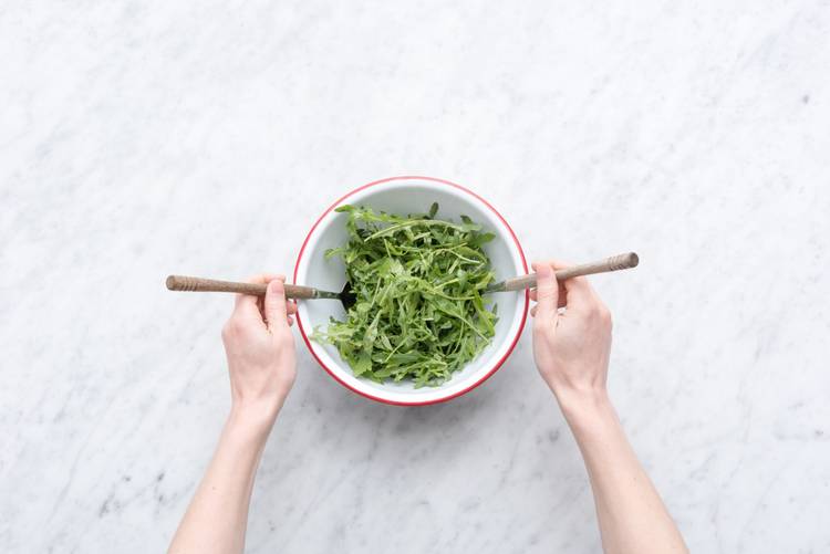 Dress the arugula