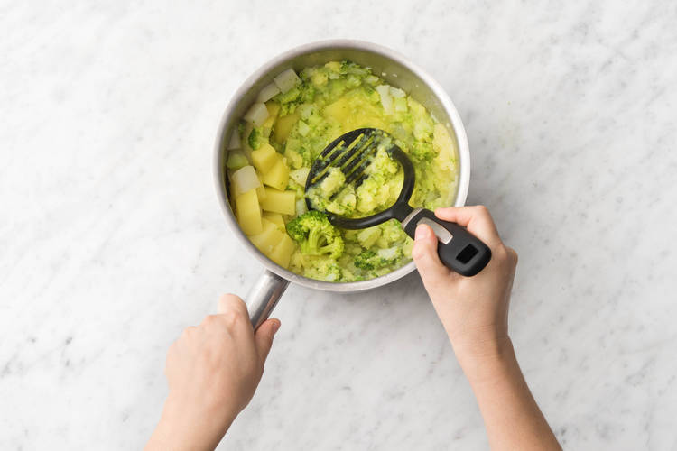 Pureer met een aardappelstamper