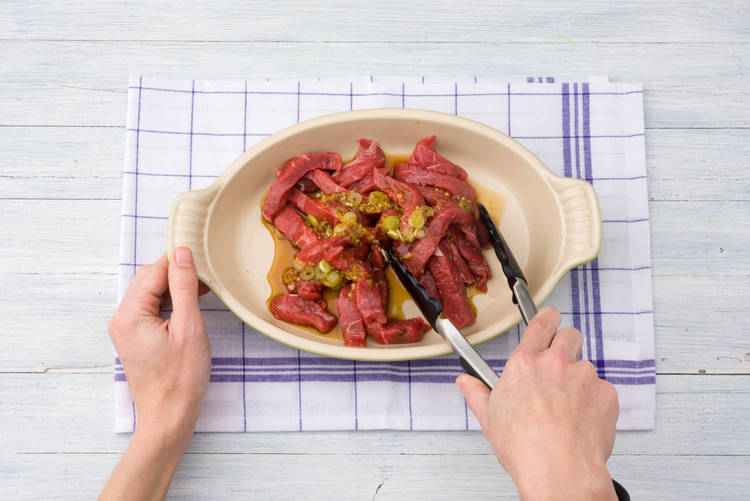 Marinate the beef strips