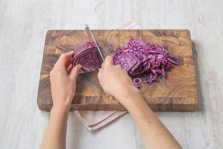 Finely slice the red cabbage
