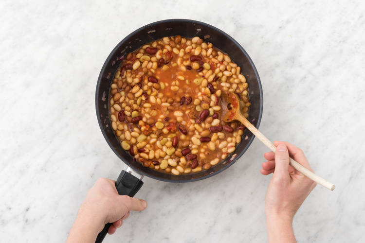 Cook beans.