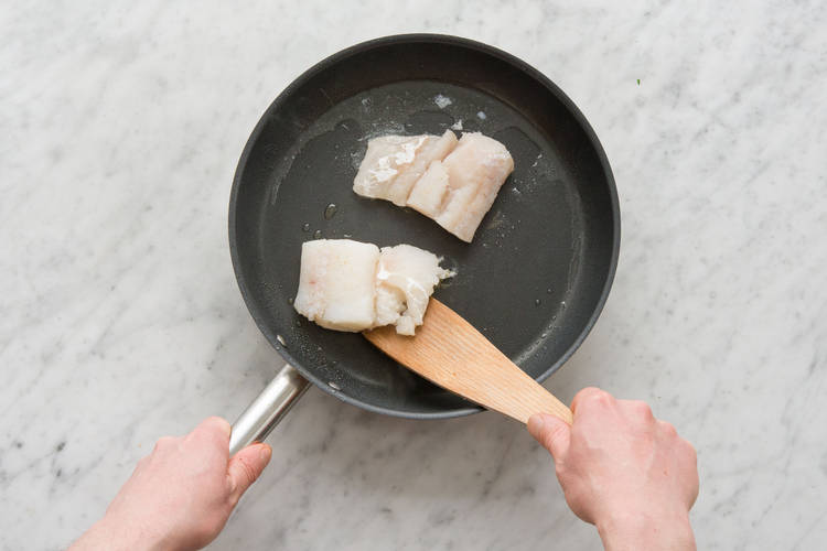 Cook fish.