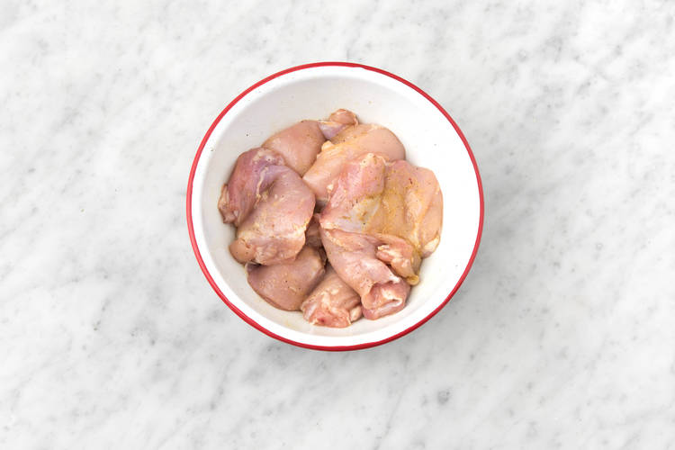 Season chicken.