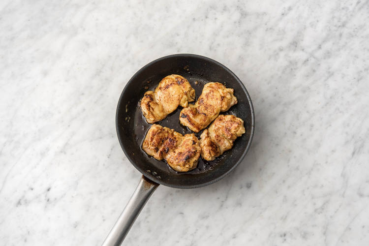 Cook chicken.