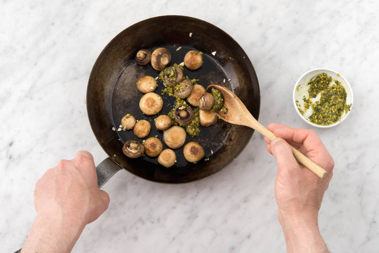 Cook mushrooms.