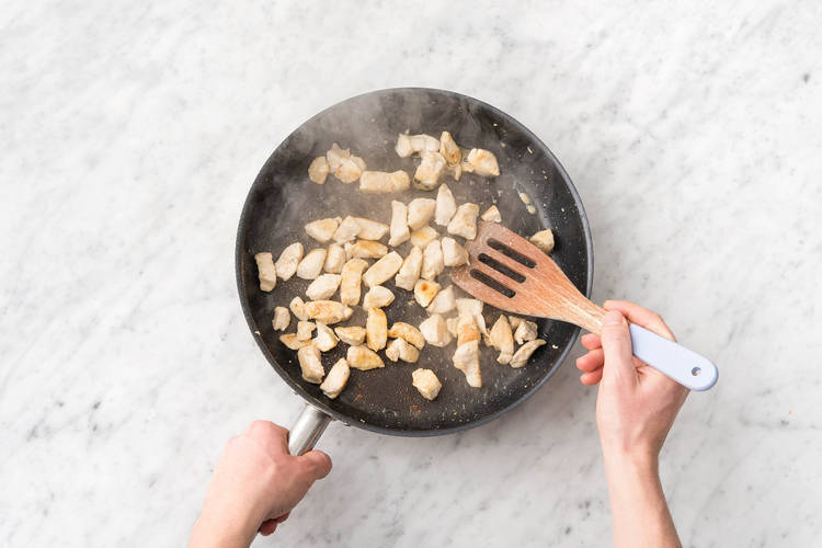 Cook chicken.