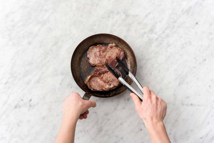 Cook the steak on each side