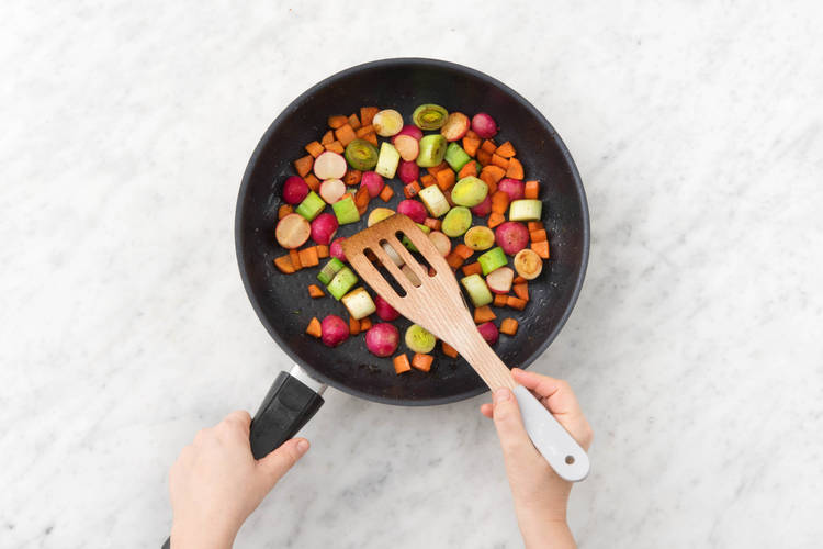 Cook veggies.