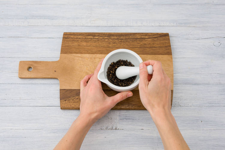 Crush peppercorns.