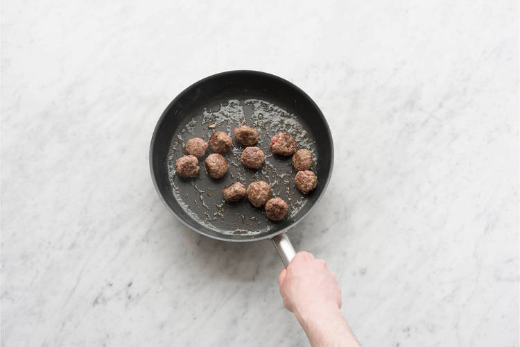 Cook meatballs.