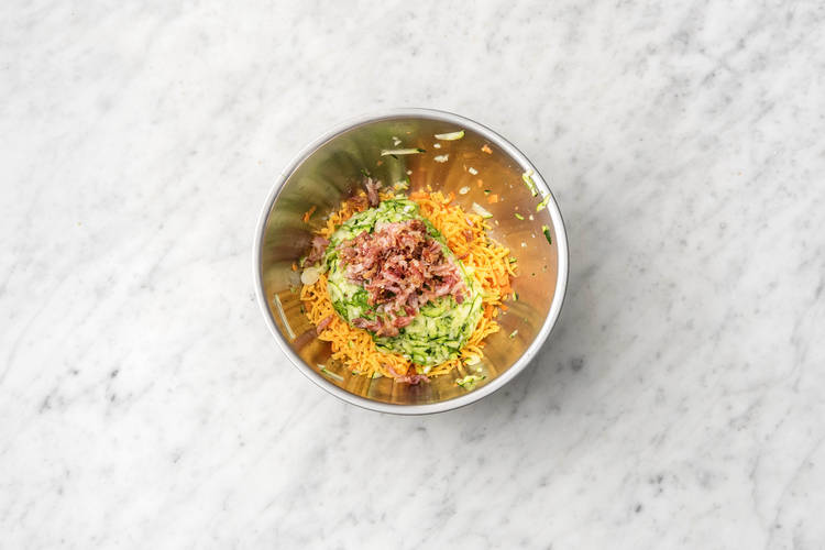 Place the ingredients into a large mixing bowl