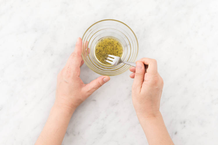 Mix the lemon zest with the spice and some oil