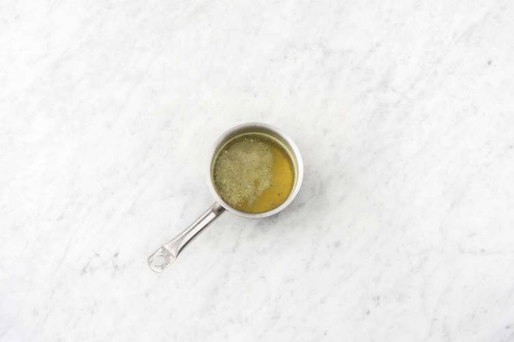Preheat oven and warm stock