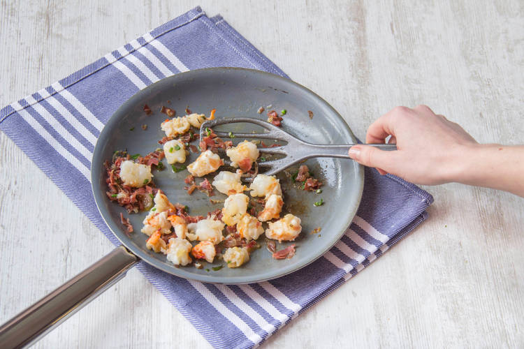 Cook prawns.