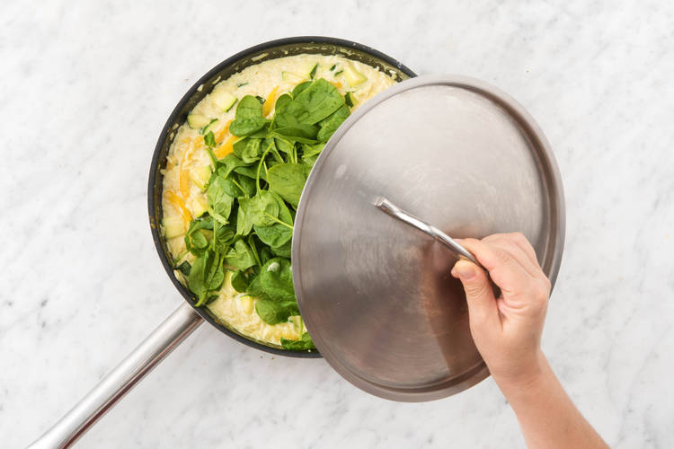 Leave to steam and wilt the spinach