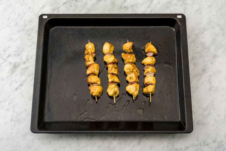 Grill kebabs.