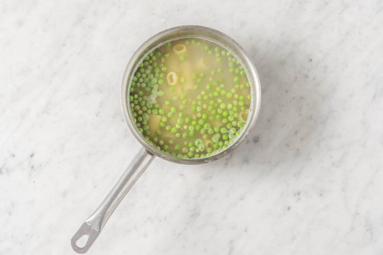 Cook pasta and peas.
