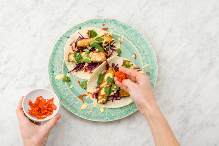 Top the tacos