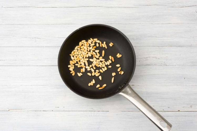 Toast pine nuts