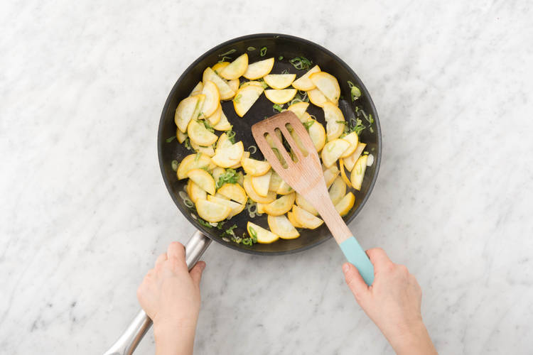 Cook scallions and squash