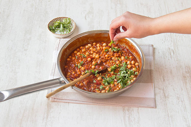 Add chickpeas and coriander.