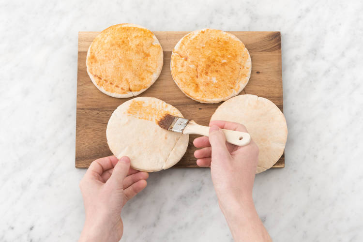 Brush the mini pita pockets