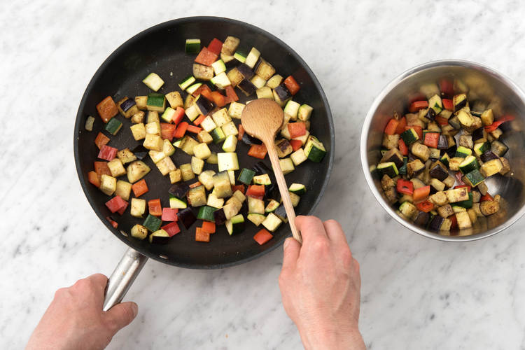 Cook veggies.