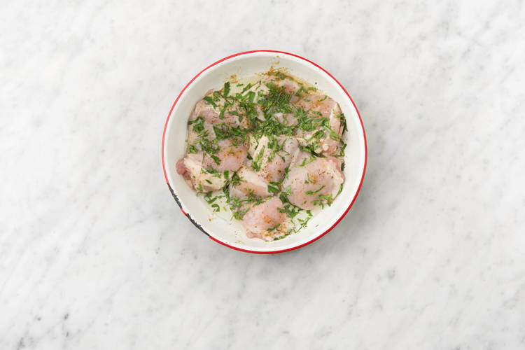 Marinate chicken.