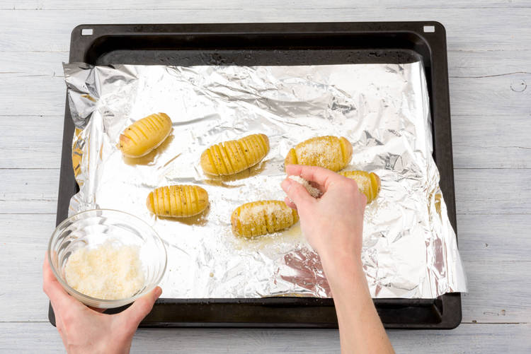 Top potatoes with cheese