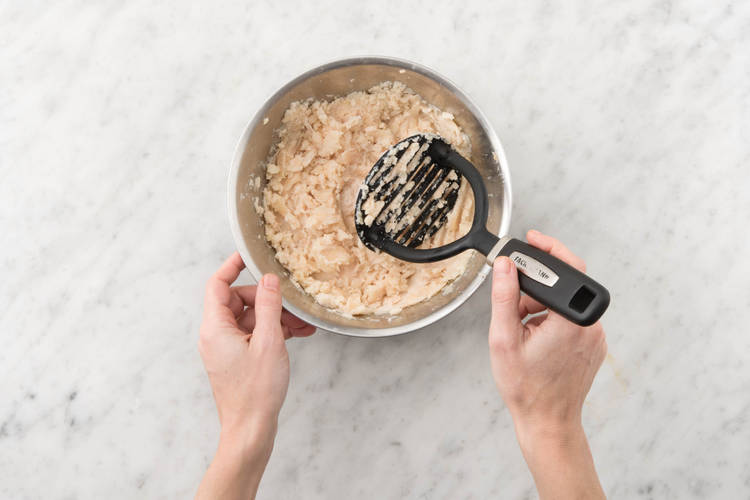 Mash the cannellini beans