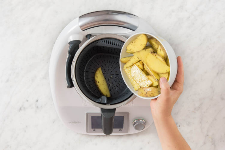 Kartoffelspalten einwiegen