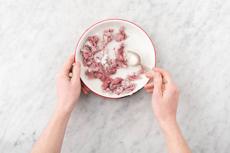 Coat the beef strips